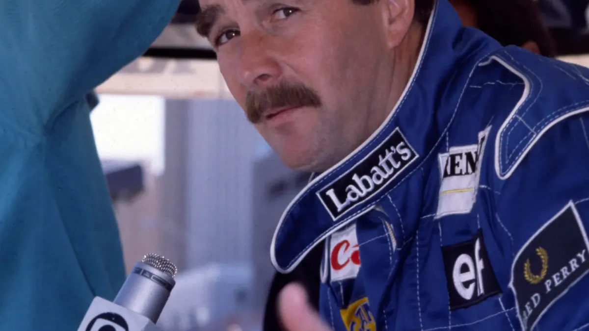 Porträttbild av Nigel Mansell.